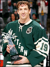 Joe Sakic holding the MVP trophy in the 2004 All-Star game