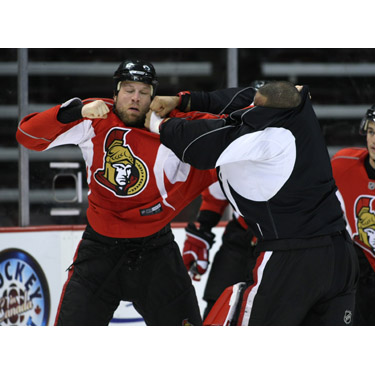 Brian McGrattan and Ray Emery fight during an Ottawa Senator's practice in 2008.