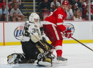 Tomas Holmstrom is out of the crease, but is questionable for goalie interference.