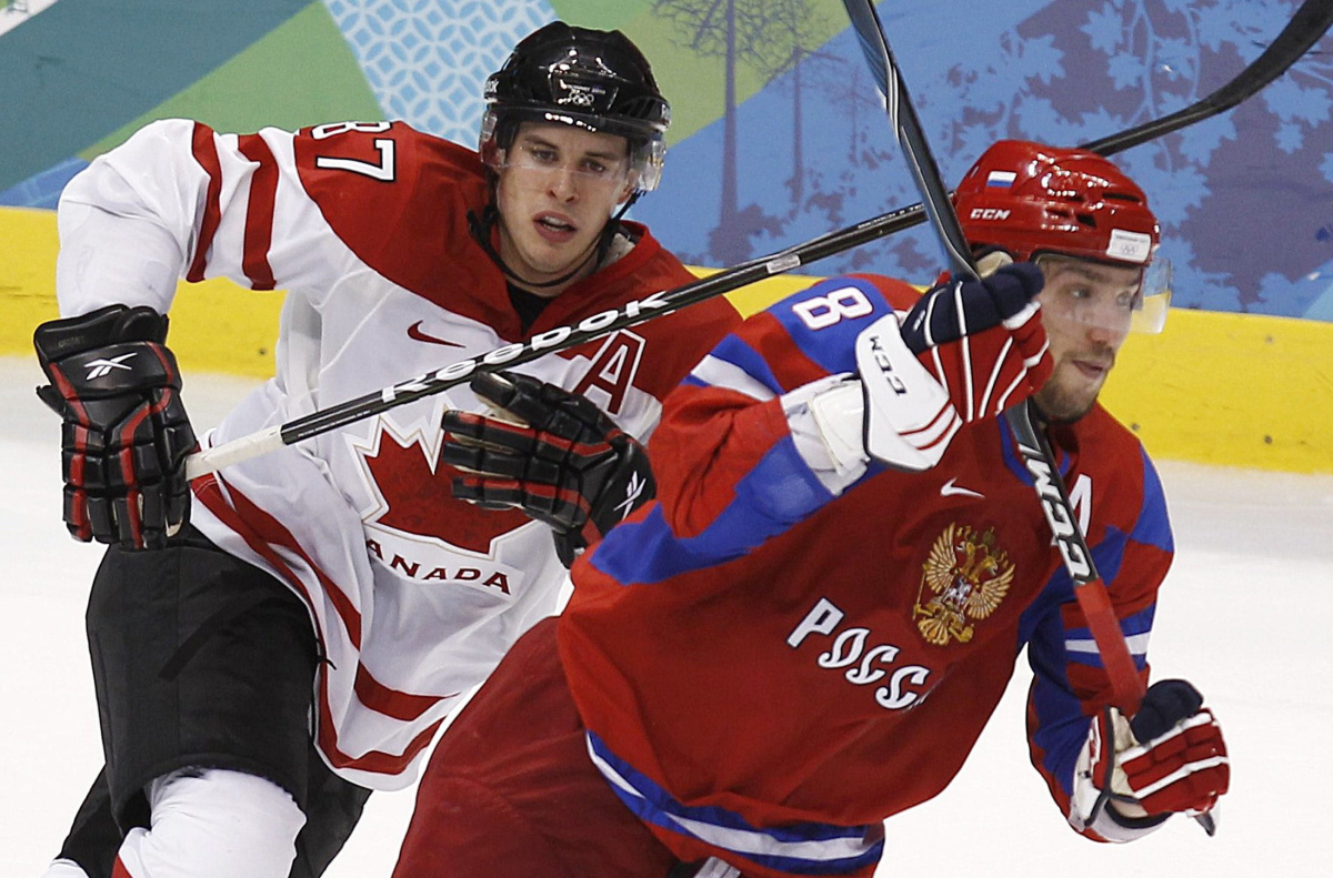 ATTENTION EDITORS - REUTERS CANADA IMAGES OF THE YEAR 2010. - Ovechkin of Russia skates next to Sydney Crosby of Canada at the Vancouver 2010 Winter Olympics