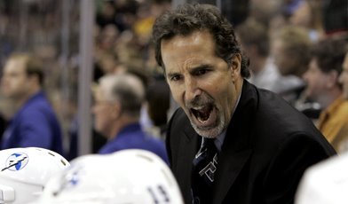 Tampa Bay Lightning head coach John Tortorella yells at his players during the final minutes of their 3-2 win over the Minnesota Wild in an NHL hockey game in St. Paul, Minn., Thursday, Jan. 4, 2007.  (AP Photo/Ann Heisenfelt)